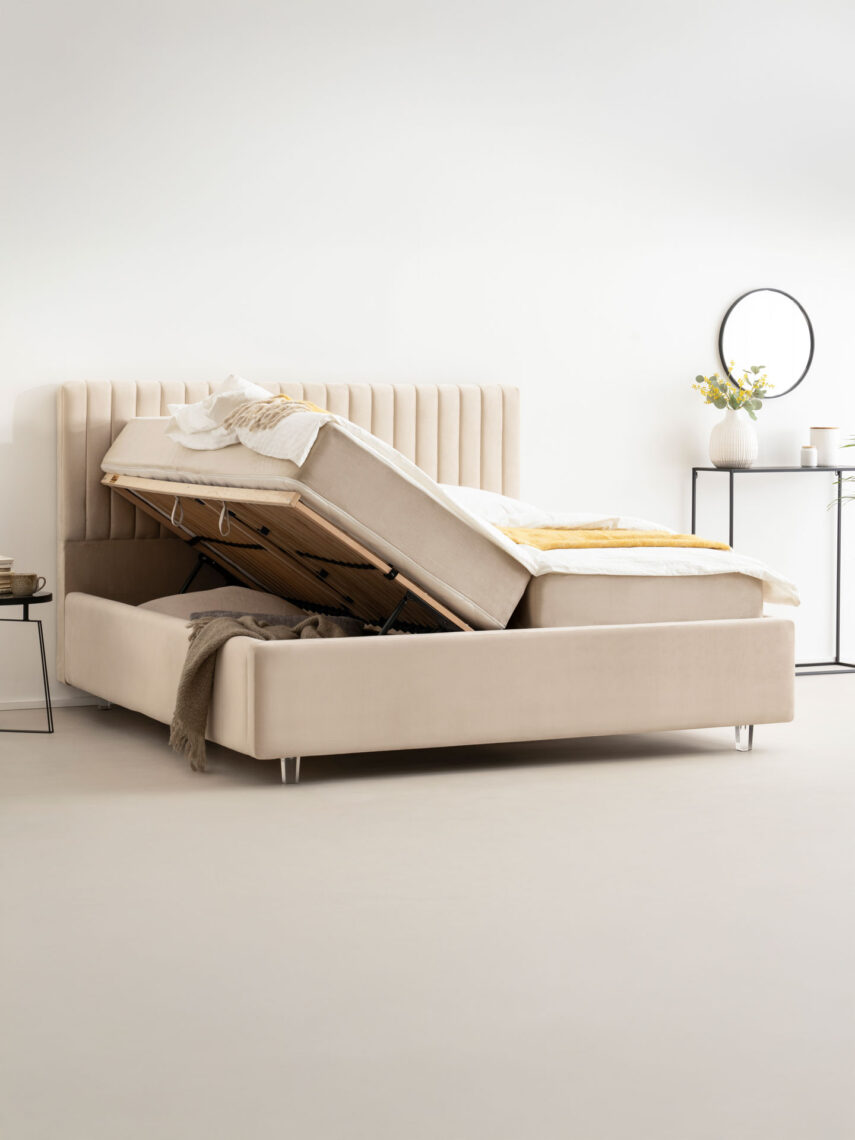 a bed with a bed frame for storage
